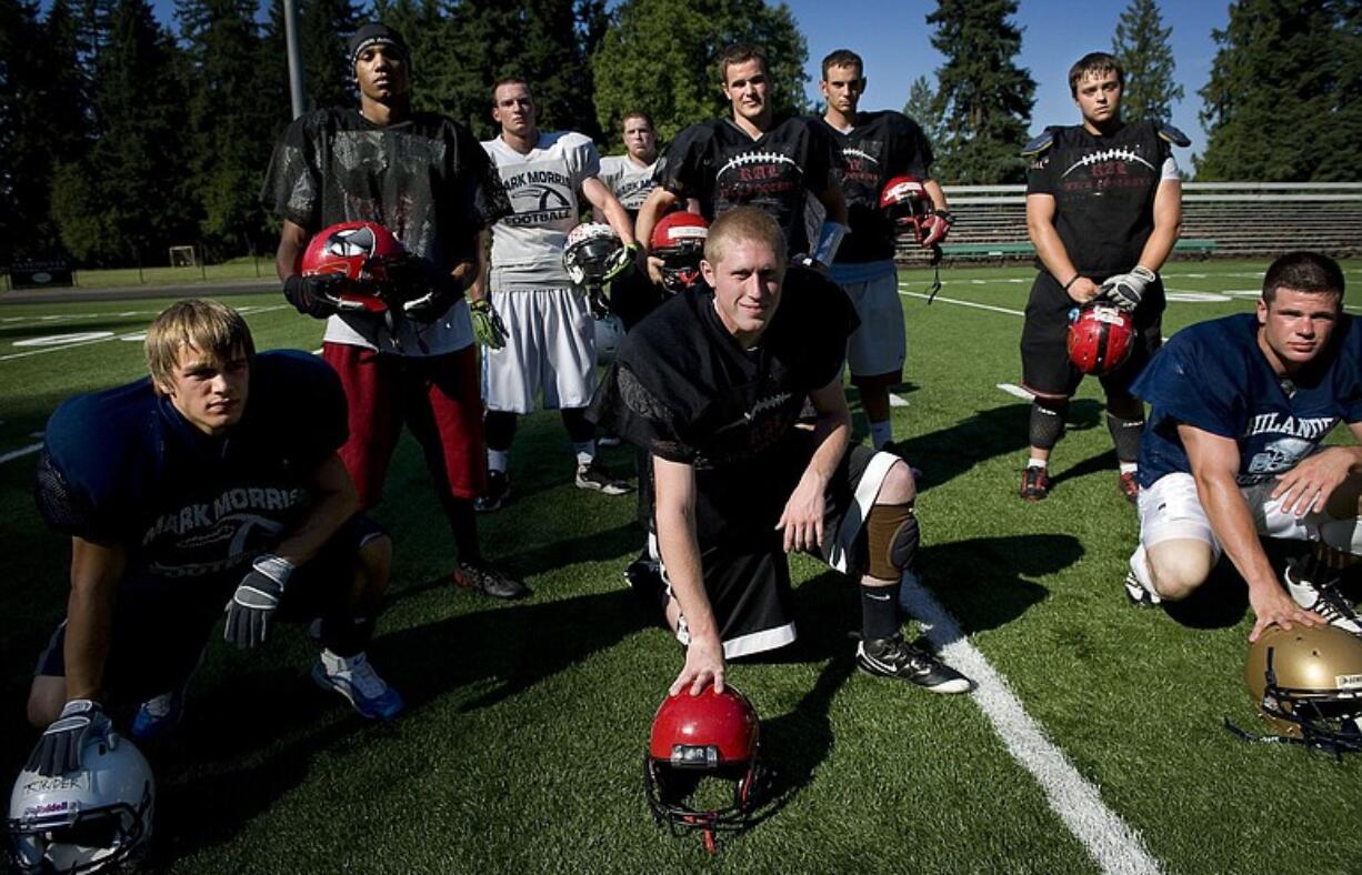 Travis Kinder of Mark Morris (front row from left to right), Gavin Johnson of R.A. Long, Lane Sari of Kelso, and (back row from left) J. Nusbaum of R.A. Long, Mark Morris' Colt Carpenter and Jake Cotterell, from Mark Morris, and R.A.