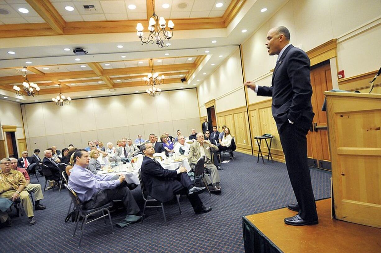 Candidate David Castillo, who's vying for the open 3rd Congressional District, speaks to supporters during a fundraising breakfast at the Heathman Lodge in Vancouver on Tuesday.