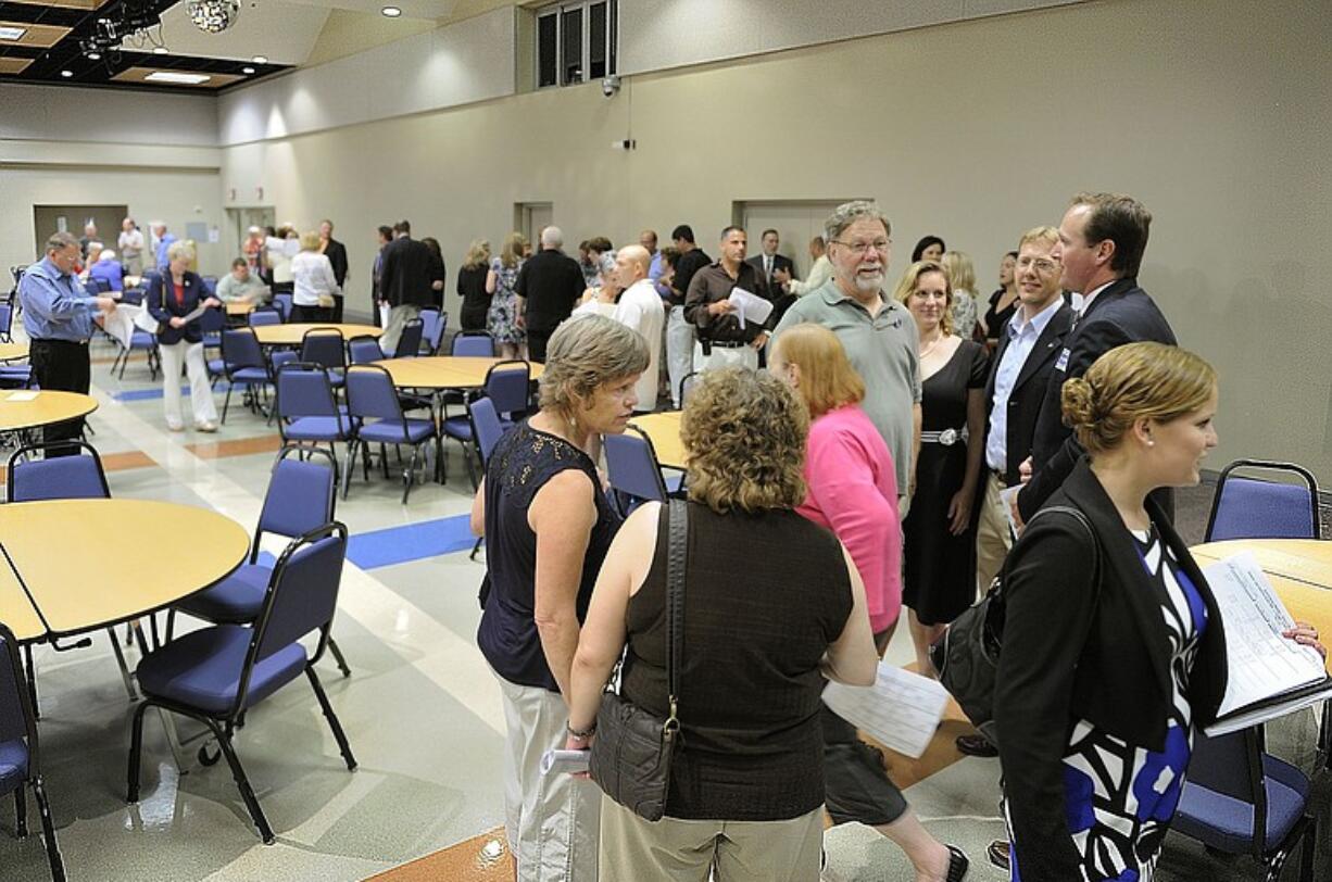 Candidates and supporters congregate at Clark College's Gaiser Hall to pore over results of Tuesday's primary.