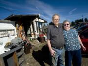 Jim and Ruth Linderman stand in front of their single-wide trailer just off West Yacolt Road.