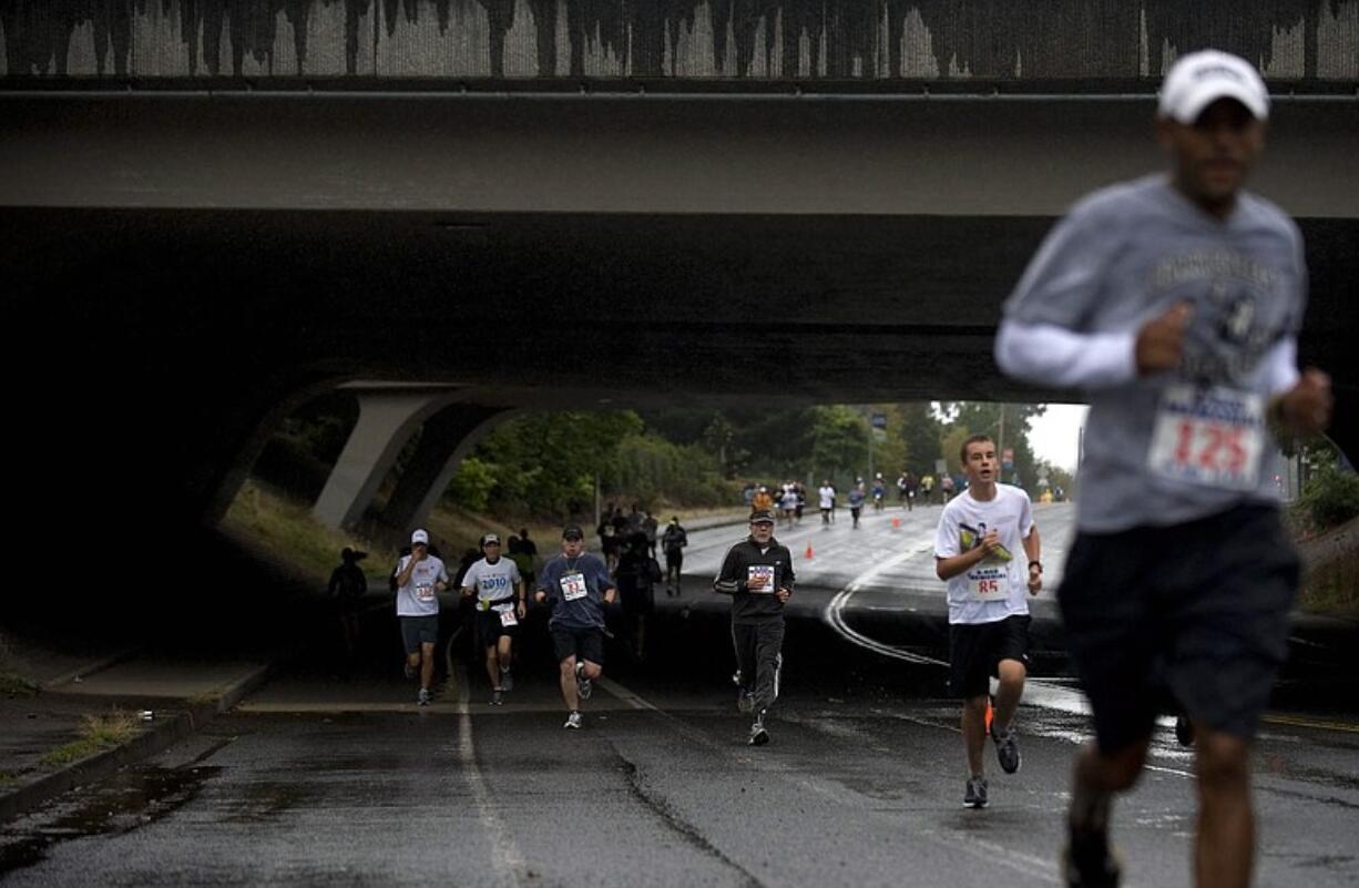 Despite rain, Sunday's scholarship event had its best turnout with 161 runners and walkers.