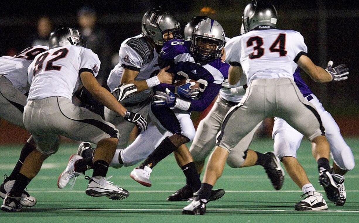 The Union defense stops Heritage ball carrier Rajheem Carrie during Week 6 action last Friday.