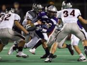 The Union defense stops Heritage ball carrier Rajheem Carrie during Week 6 action last Friday.