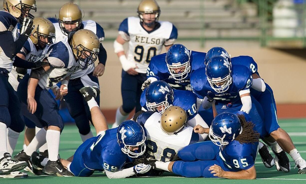 The Mountain View defense stops Kelso ball carrier Slate Miller, #28, at McKenzie Stadium, Friday, October 15, 2010. Mountain View won 28-7.