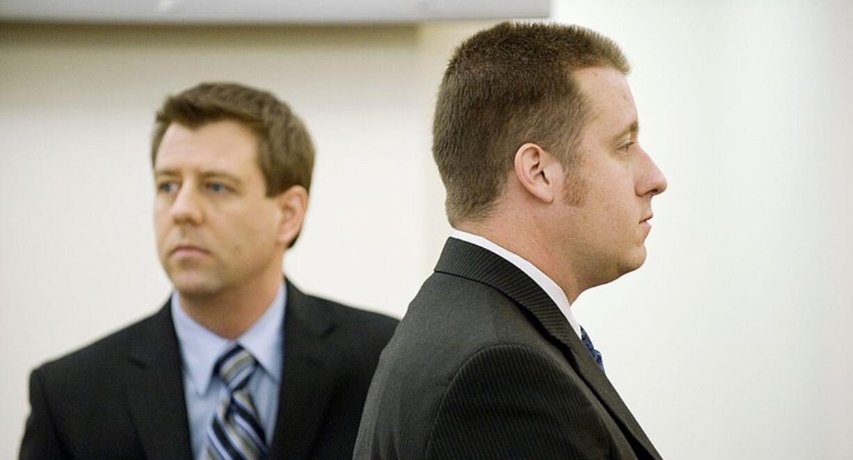 Former 3rd Congressional candidate, David Hedrick, right, makes a preliminary appearance in Clark County District Court on suspicion of assaulting his wife.