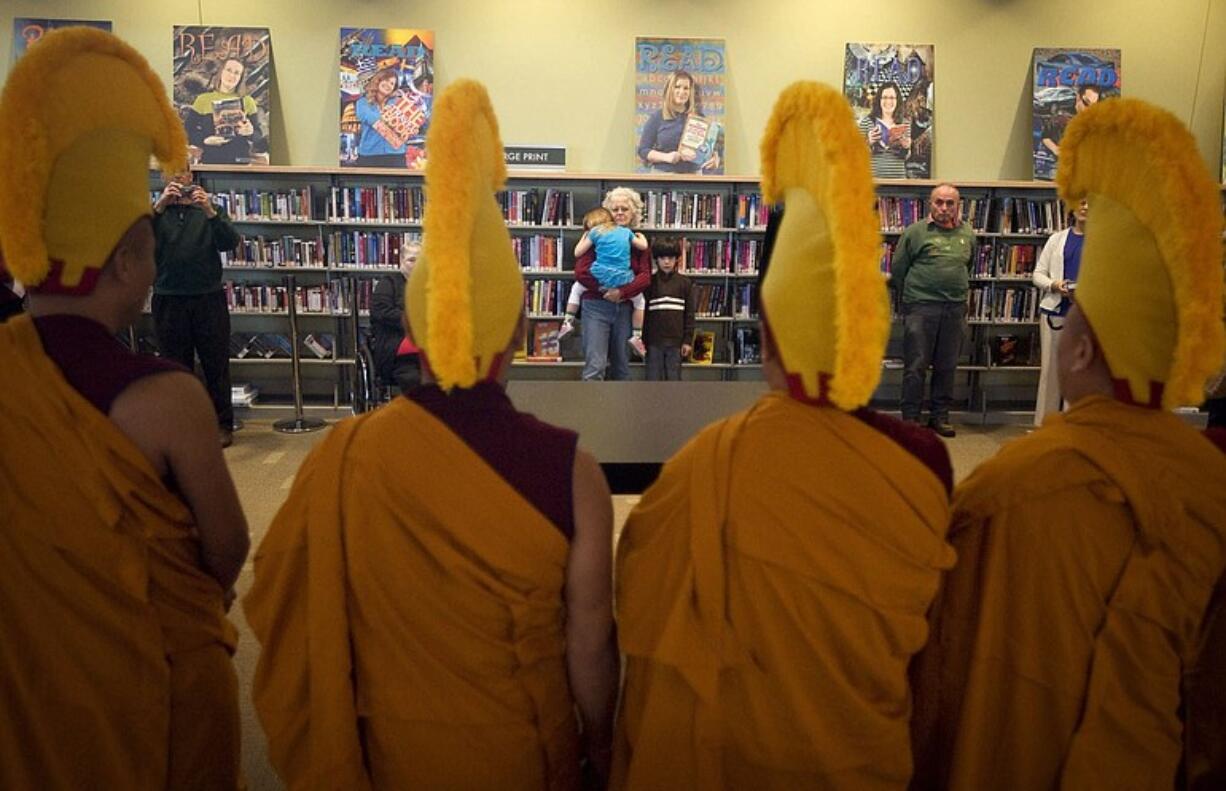 Monks from Drepung Loseling Phukhang Monastery wear orange and red because their culture considers those colors the humblest and least attractive, according to translator Tenzin Sherab of Gresham, Ore.