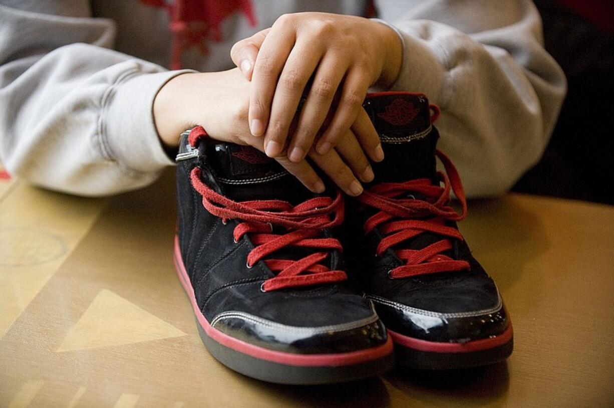 Stevenson High School's Jenay Walsh obtained this pair of basketball shoes through Bridge the Gap, which aids foster teens.