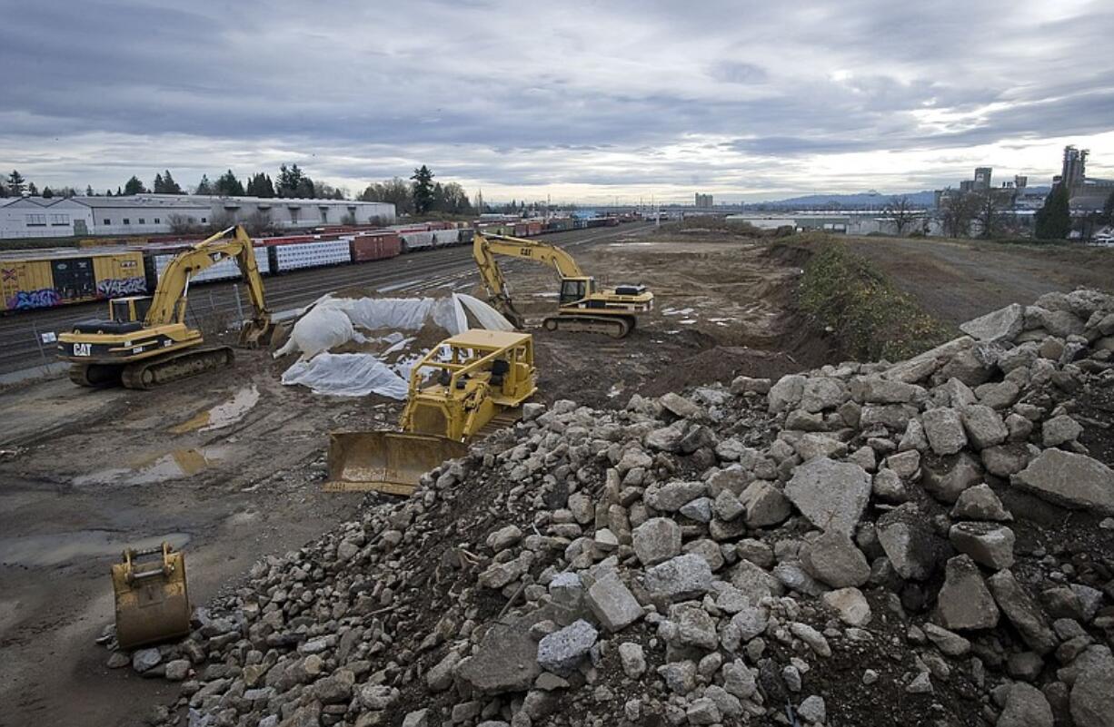 Taxpayers are footing the bill to clean contamination at the former site of a metal scrapping yard in west Vancouver. The property will be used for auxiliary tracks as part of a $150 million rail improvement project.