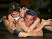 Tyler Davis, Union (L) beats Nate Williams, Ridgefield (R) at Clark County Wrestling Championships at Skyview High School.