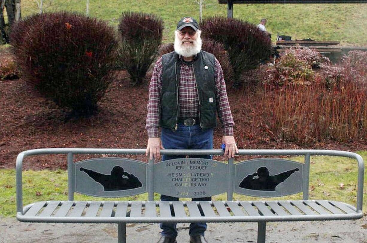 Bruce Petersen stands behind the bench he built to honor Jeff Le Bouef.