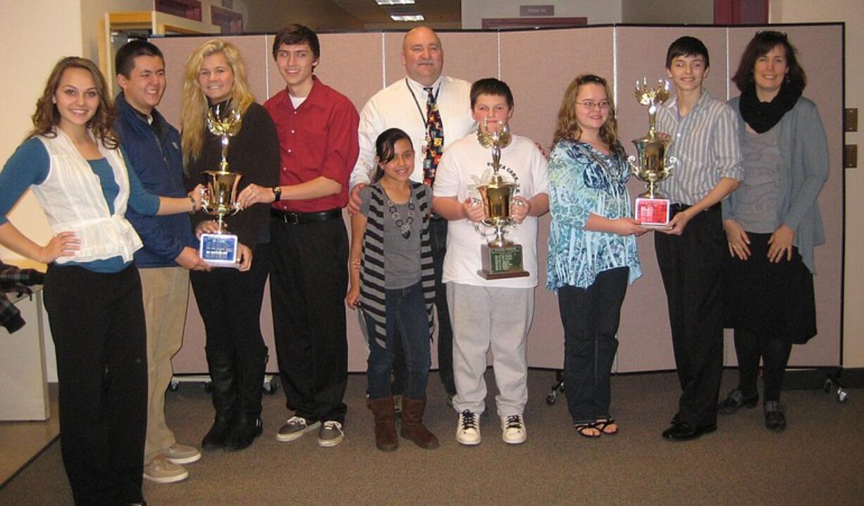 Vancouver Public Schools students helped raise $47,525 for the Vancouver School District Foundation: Alison Archer, from left, Nick Durig, Joani Dahmen, and Jon Rapacz, Columbia River; Laura Munoz, teacher Dave Warner, and Devin Weber, Fruit Valley; Hunter Gamble, Peyton Fredrickson, and student adviser Enid Axtell, Alki.