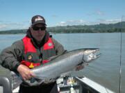 Colonel Thomas of Gresham landed this summer chinook near the mouth of the Sandy River on the third day of the season in 2010.