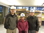 Adin Dunning, left, of The Miller/Hull Partnership and lead architect for the new Vancouver Community Library under construction on C Street, led a tour of the unfinished building in January for Pat and Don Cassady.