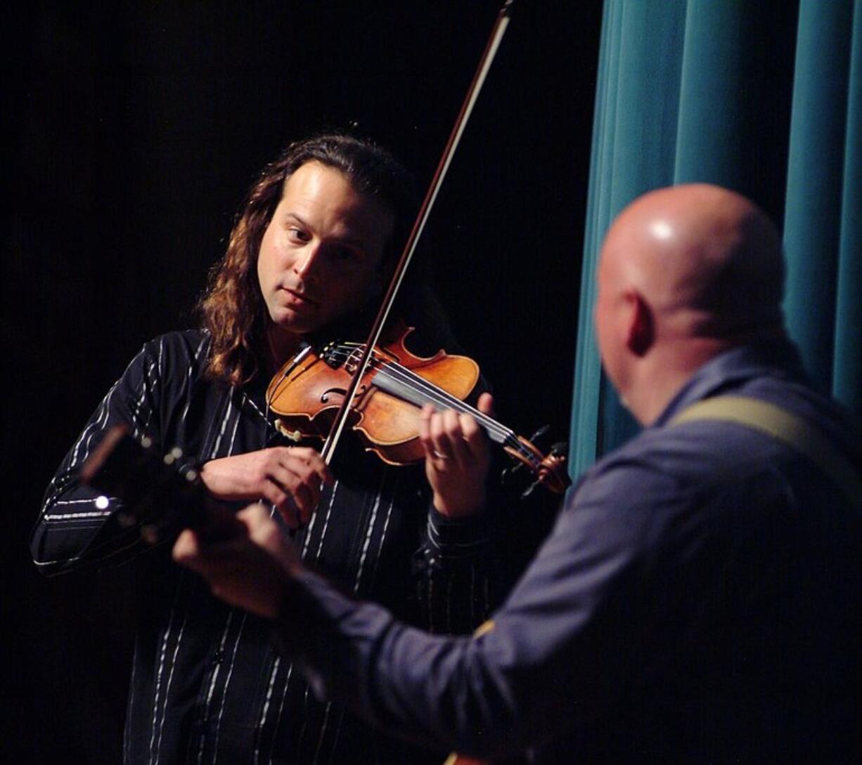 Violinist Aaron Meyer and guitarist Tim Ellis rock out at Skyview High School on Feb.