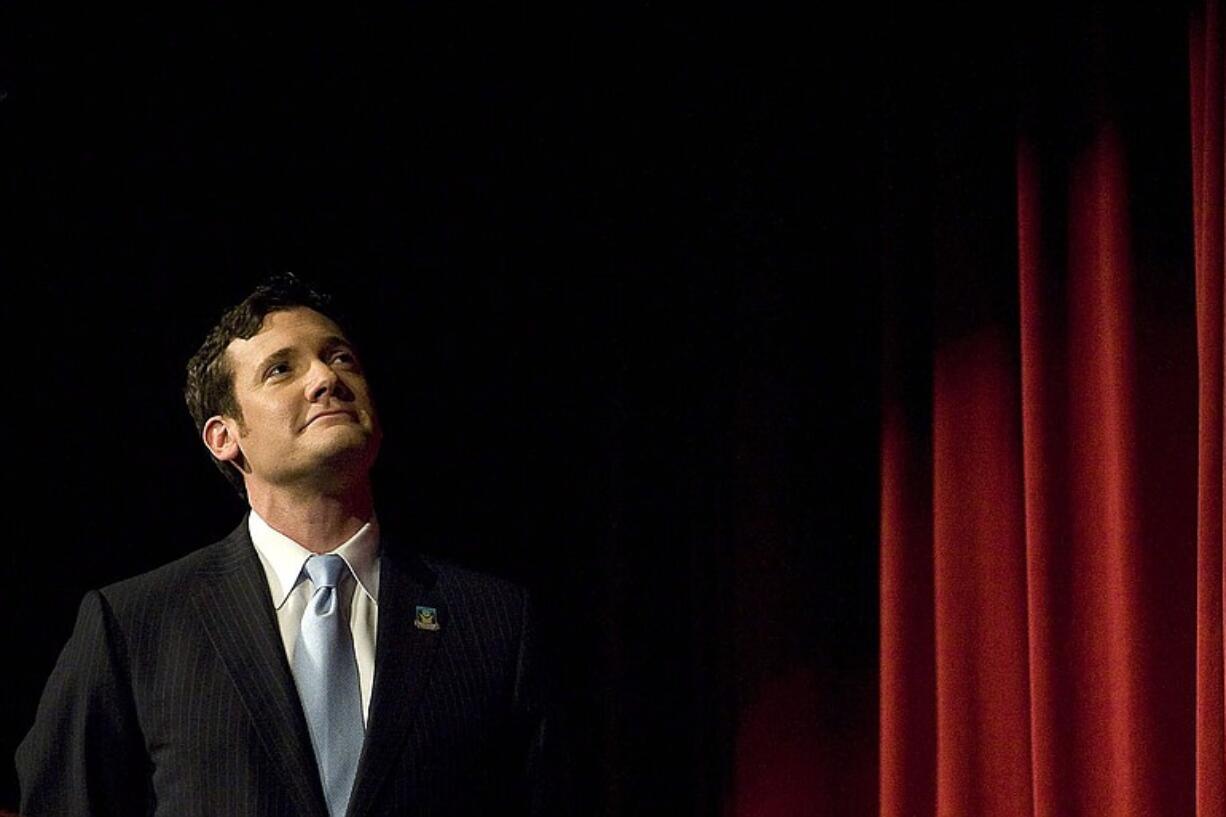 Vancouver Mayor Tim Leavitt watches a short video while delivering the annual state of the city address inside the Evergreen High School auditorium on Wednesday.