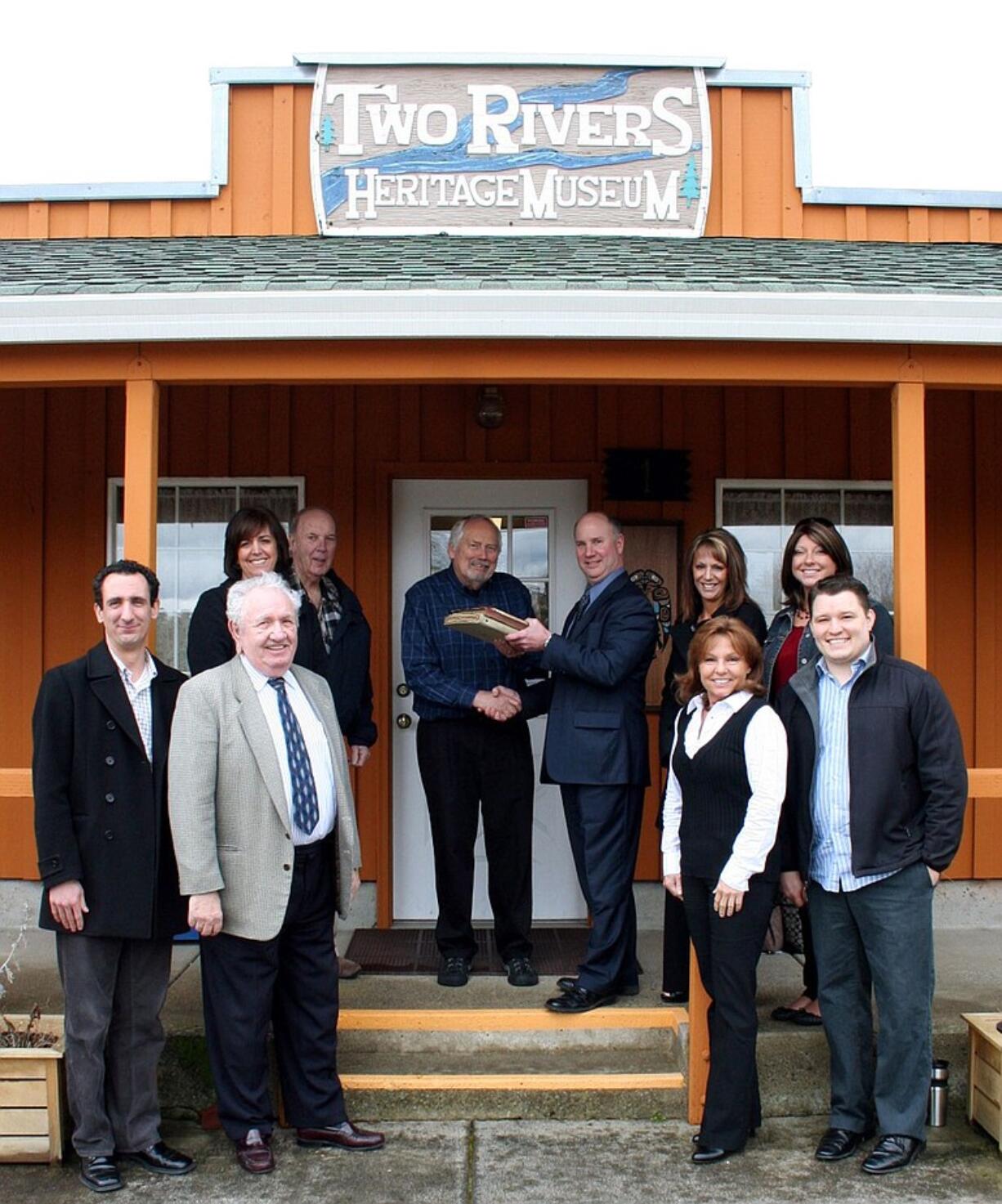 The Camas-Washougal Chamber of Commerce donated its 100-year-old meeting logs to the Two Rivers Heritage Museum.