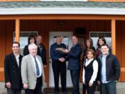 The Camas-Washougal Chamber of Commerce donated its 100-year-old meeting logs to the Two Rivers Heritage Museum.