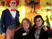 Uncle Sam (Jerry Sallee) and Elvis (Mark Stephens) flank Milada Allen, executive director of the new Clark County Veterans Assistance Center, on March 12 at the &quot;Freedom Flapjack Breakfast.&quot;