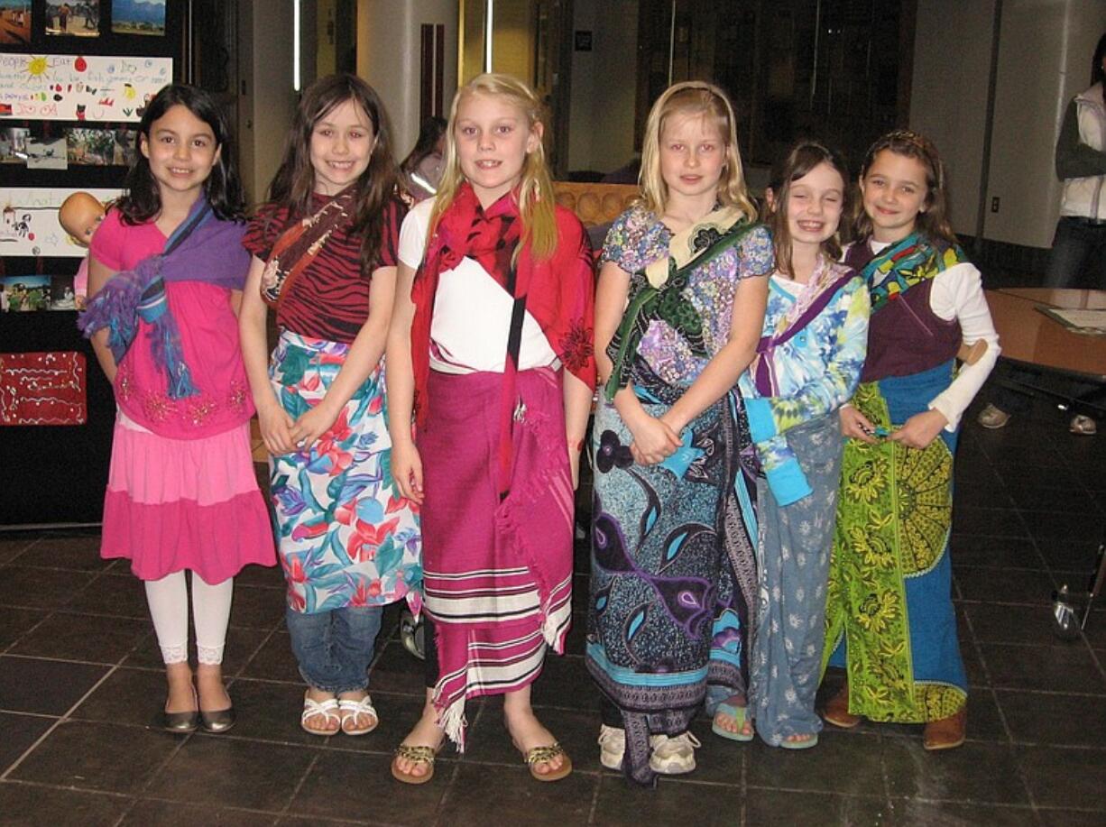 Girl Scout Troop 40332 from Ridgefield celebrated Girl Scout Thinking Day dressed in the native dress of Malawi, Africa.