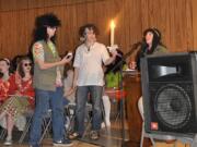 From left, Miriam Jaffe, Jackie Wetchler, Ben Dreon, Mitchell Kaiser, and Rabbi Elizabeth Dunsker participate in Havdalah, part of the Congregation Kol Ami's Purim celebration.