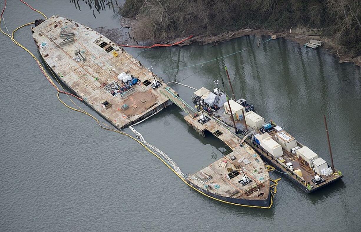 The Davy Crockett, shown in an aerial view last March, was surrounded by a cofferdam and dismantled in place.