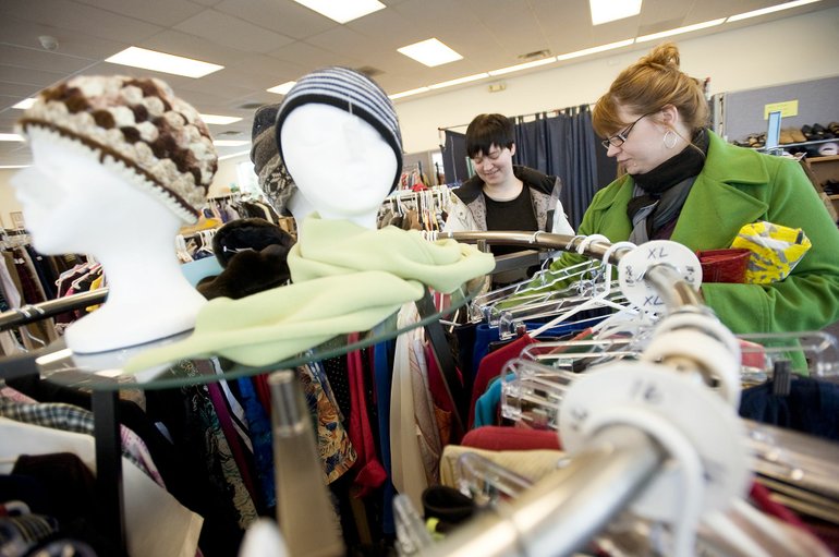 Customers Brianne Stoner, 16, left, and her mom, Shari Stoner, shop at the new Second Chance Thrift Store on St.