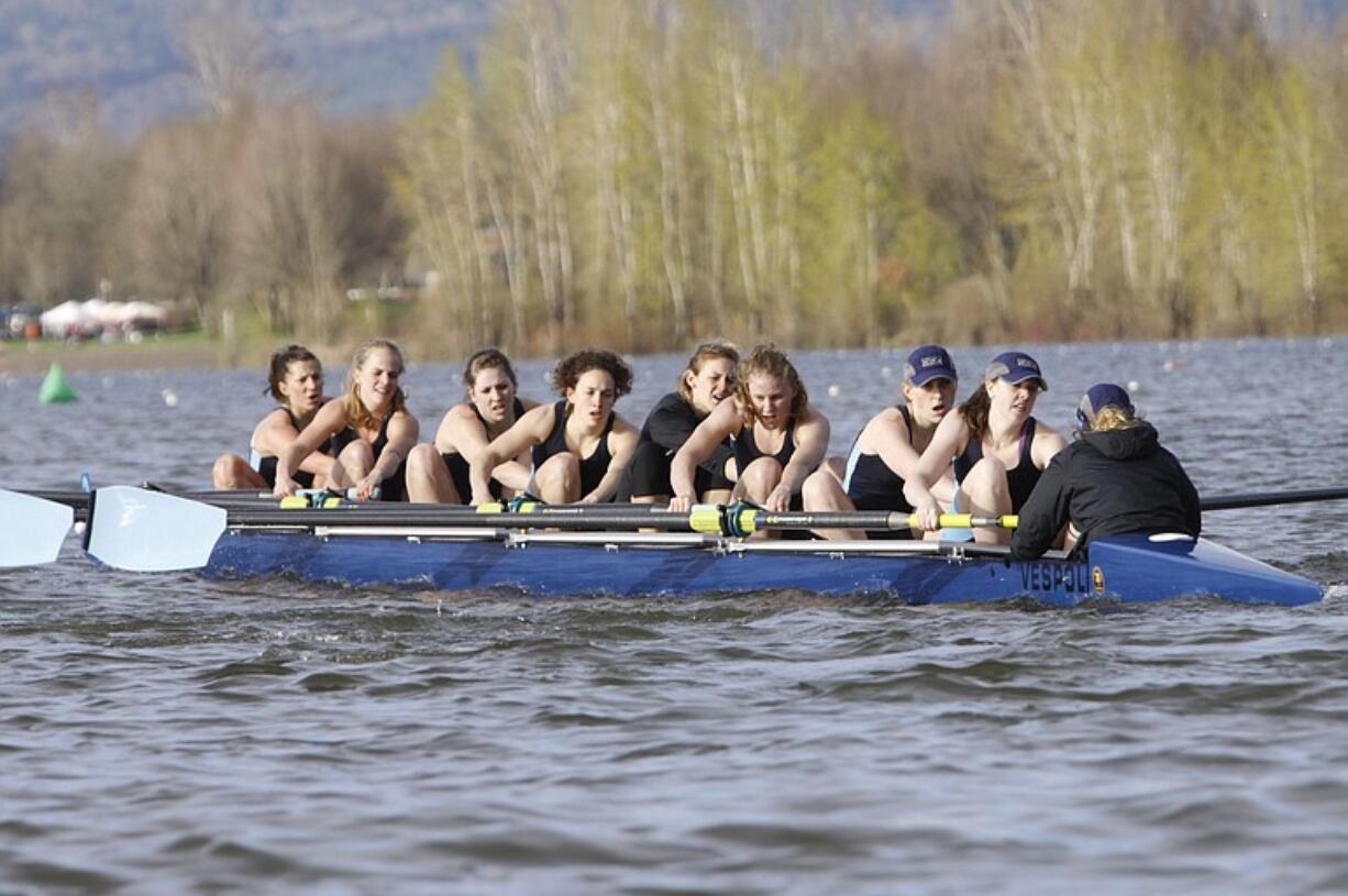 Jean Piette, fourth from right, rows with the Western Washington varsity eight.