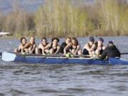 Jean Piette, fourth from right, rows with the Western Washington varsity eight.