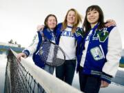 Mountain View High School senior tennis players, from left, Jenna Grillo, Julie Christen and Shari Gray, Wednesday, April 13, 2011.