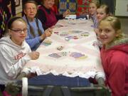 Barbara Sizemore demonstrates the art of hand-quilting at the North Clark Historical Museum Annual Quilt Show.