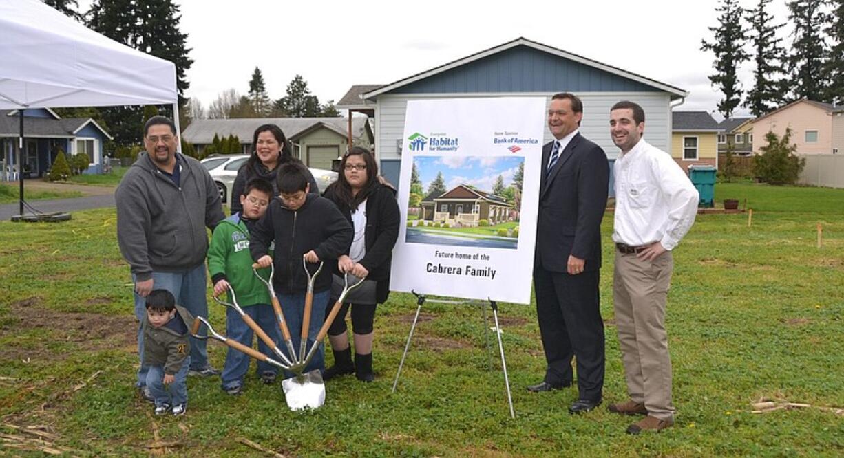 Habitat for Humanity broke ground on the first of three homes it plans to build in 2011. From left: Tyce Cabrera, Cristino Cabrera, Ky Cabrera, Lucrecia Tudela, Champ Cabrera, Ritachiah Cabrera.