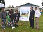 Habitat for Humanity broke ground on the first of three homes it plans to build in 2011. From left: Tyce Cabrera, Cristino Cabrera, Ky Cabrera, Lucrecia Tudela, Champ Cabrera, Ritachiah Cabrera.