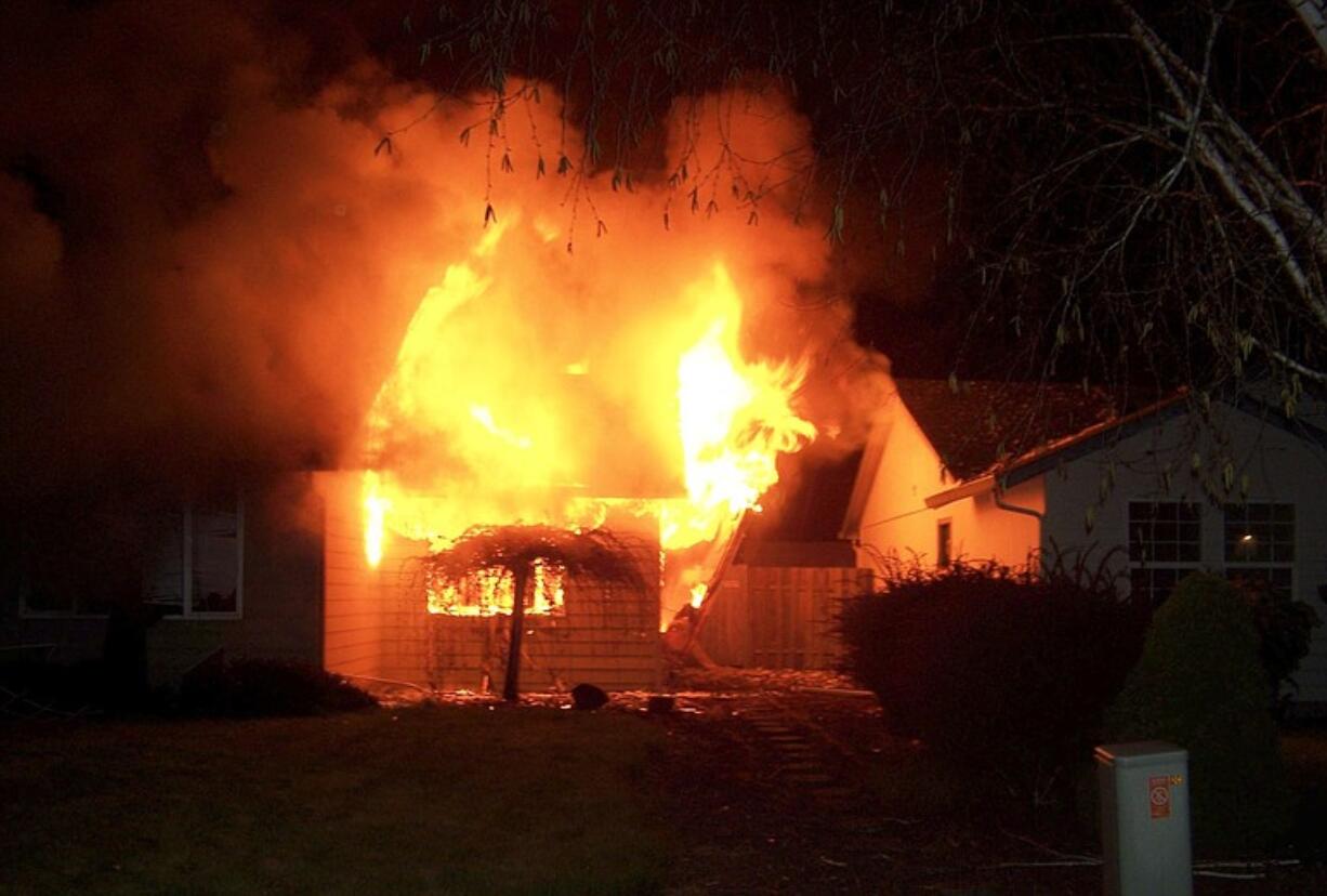 Firefighters found this house at 15304 N.E. 13th Circle fully involved when they arrived shortly after 1:30 a.m. this morning.