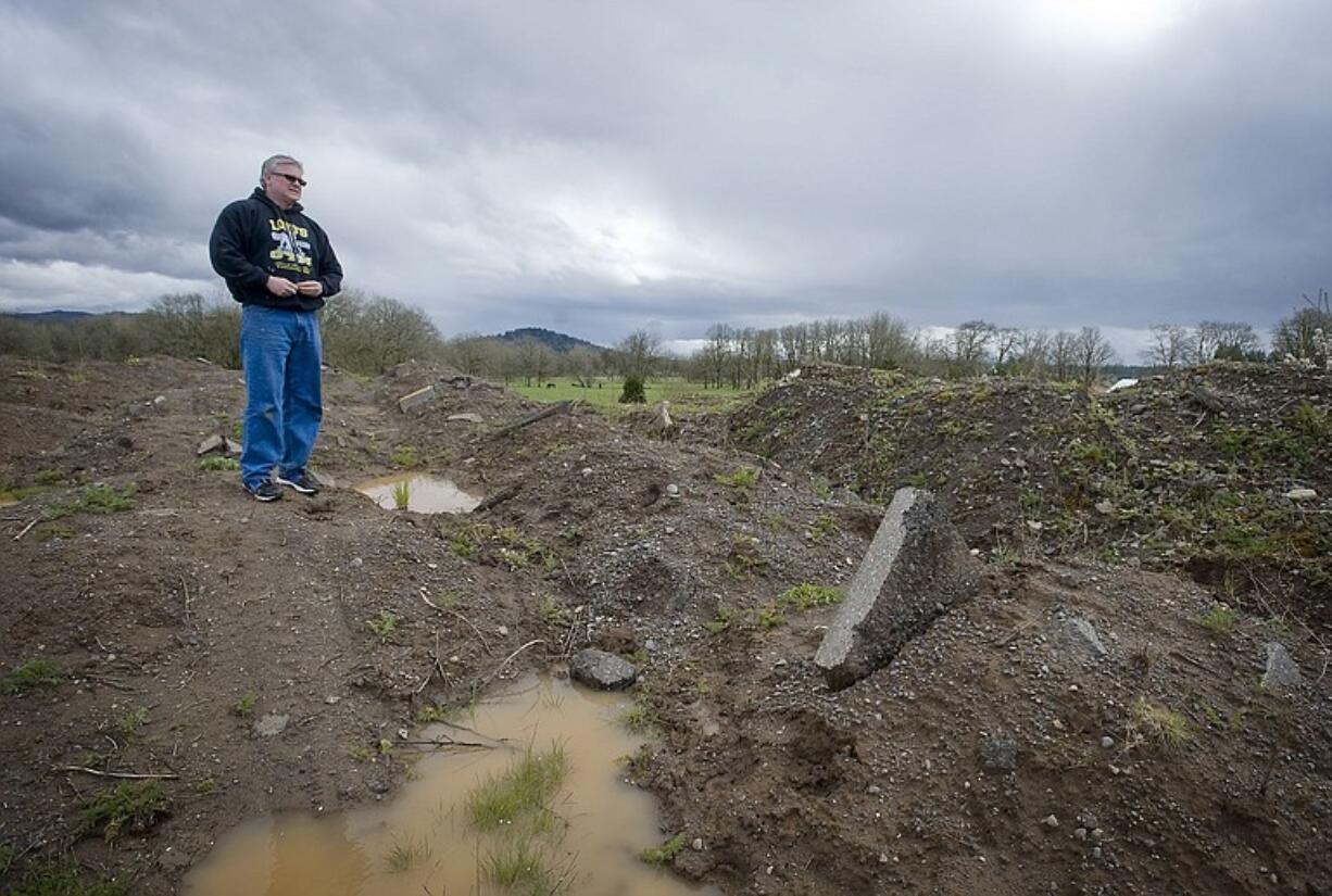 Developer Dave White on Monday gives a tour of the eastern edge of his property near Northeast 162nd Avenue.