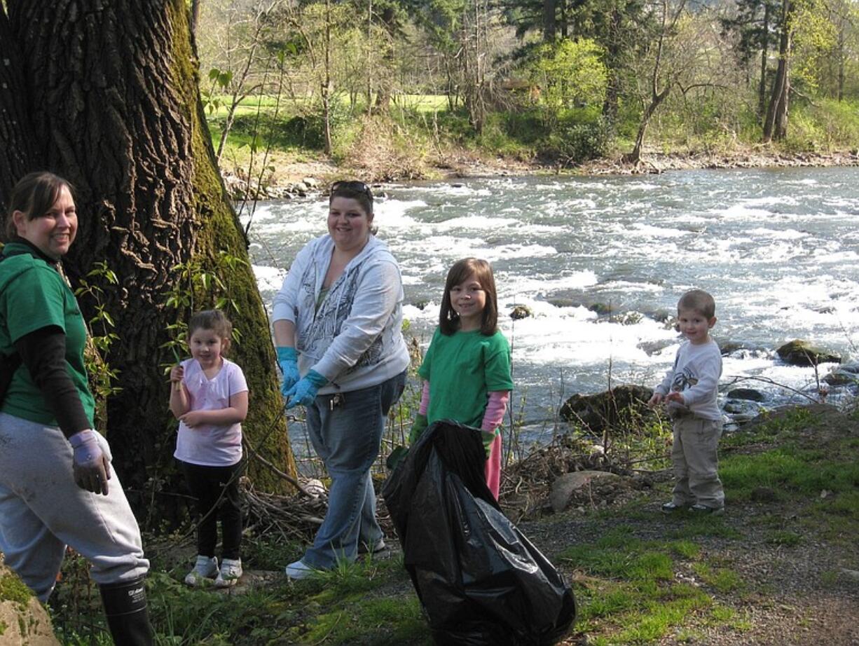 Members of Girl Scout Daisy Troop 45486 were among volunteers who pulled weeds at Hathaway Park on the Washougal River during an Earth Day event.