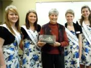 Battle Ground: Betty Davenport showed the 2011 Battle Ground Rose Princesses the tiara she wore as the Queen in Calico of the 1955 Battle Ground Centennial during their visit to the Daughters of the Pioneers of Washington meeting.