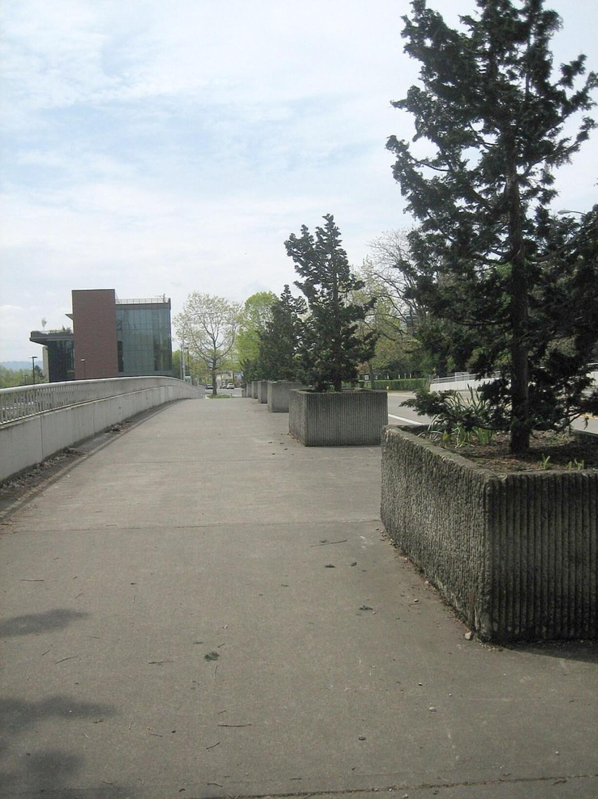 Esther Short: The planter boxes on the Evergreen Boulevard-I-5 overpass were spruced up in anticipation of the opening of the new library in July.