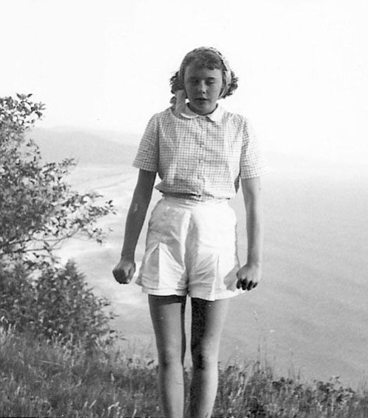 Jan Thompson at 14, looking cold but enjoying her visit to the Oregon Coast.