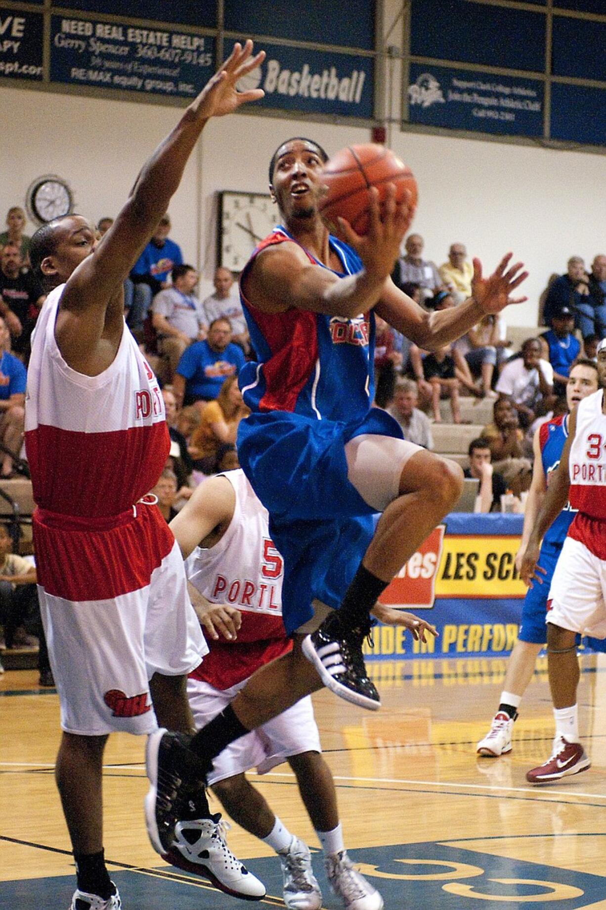 Vancouver Volcanoes guard Josh Tarver drives to the to the basket against the Portland Chinooks in Friday's playoff game at the O'Connell Center at Clark College.