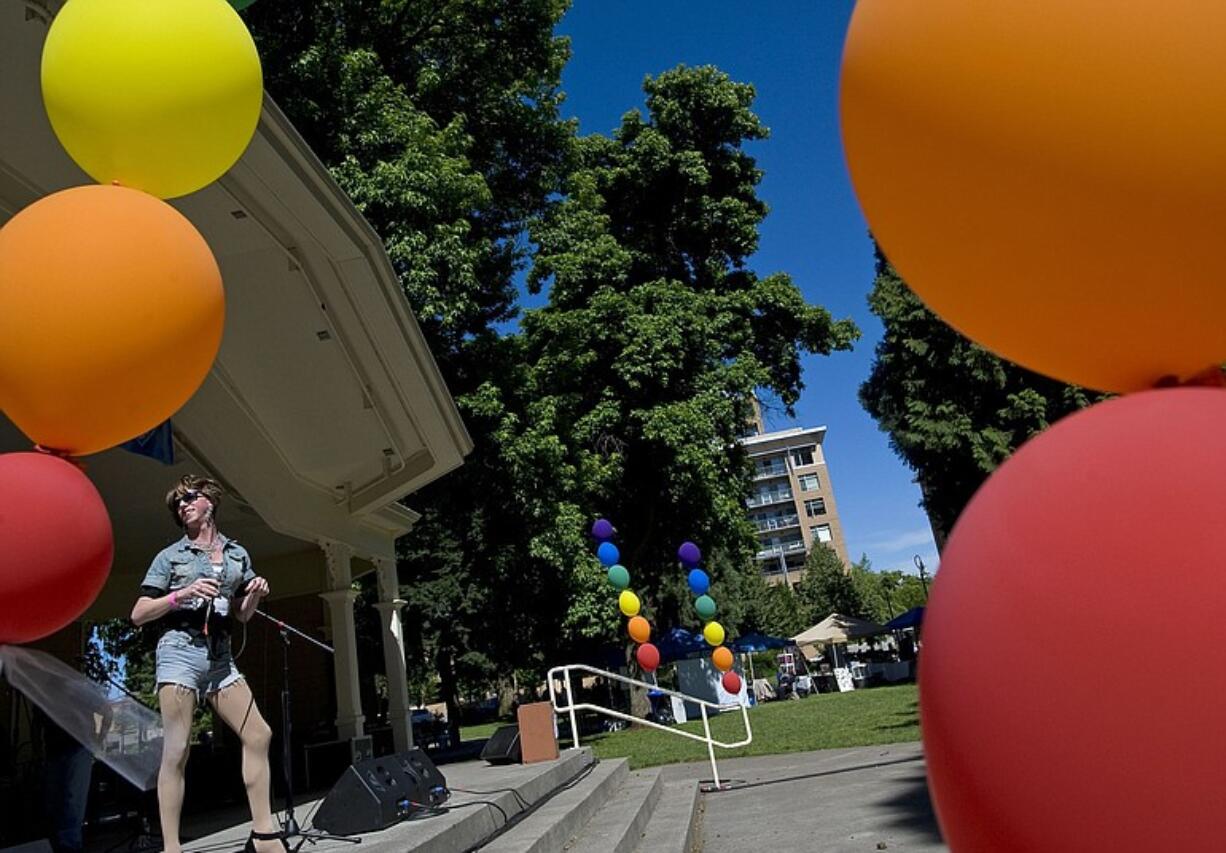 Gender illusionist Zora Phoenix performs &quot;Faith&quot; by George Michael at the 17th annual Saturday in the Park celebration of Vancouver's lesbian, gay, bisexual and transgender community.