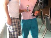 Captain Scott Johns, left, and Firefighter-Paramedic Scott Squires won the worst dressed and shortest drive awards during the Bob Allen Memorial Golf Tournament.