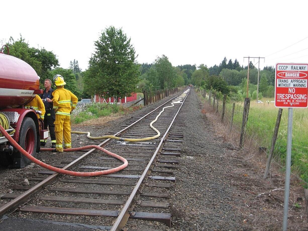 Crews mop up an early morning rail trestle fire north of Vancouver this morning.