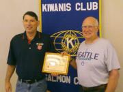 Salmon Creek -- Dewey Weber of the Salvation Army, left, presents Bruce Davis, a member of Salmon Creek Kiwanis, with a plaque of appreciation.