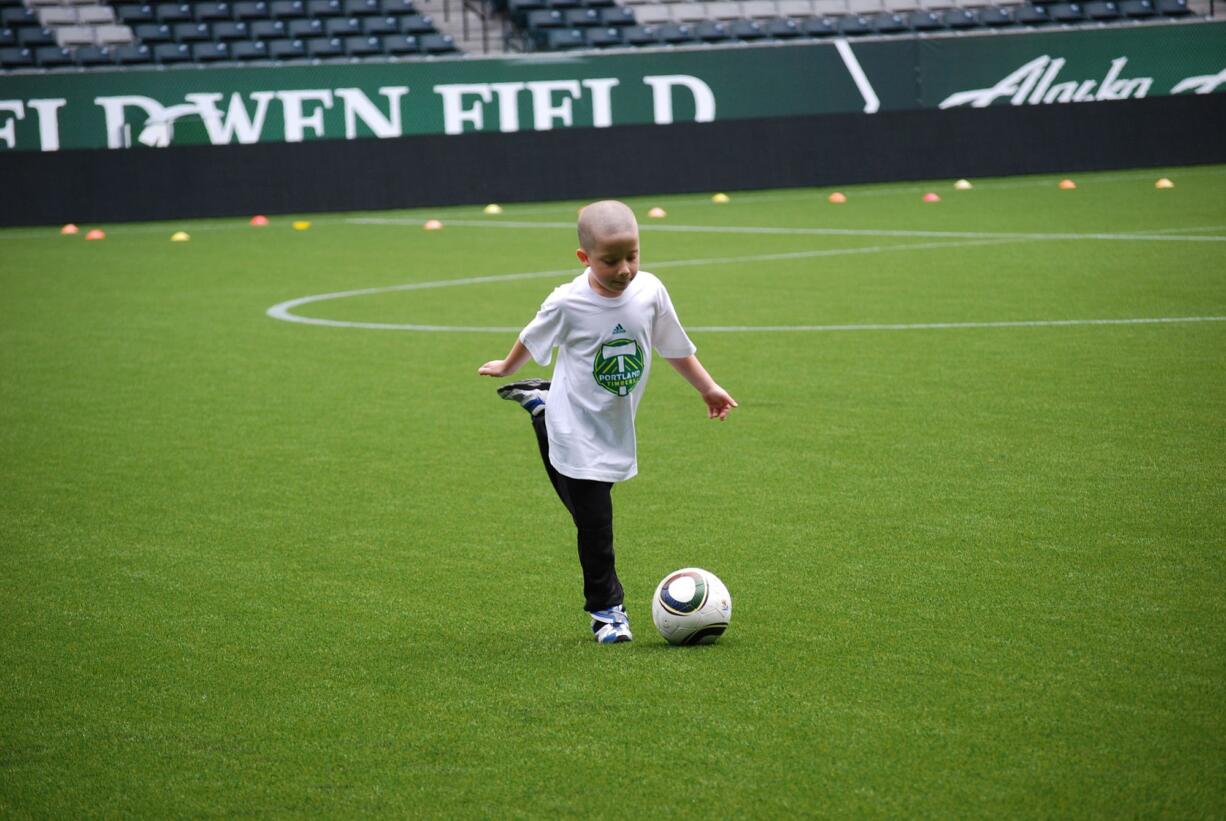 Ayden Urban is one of a whole bevy of Arc of Southwest Washington kids who enjoyed a romp at Jeld-Wen Field.