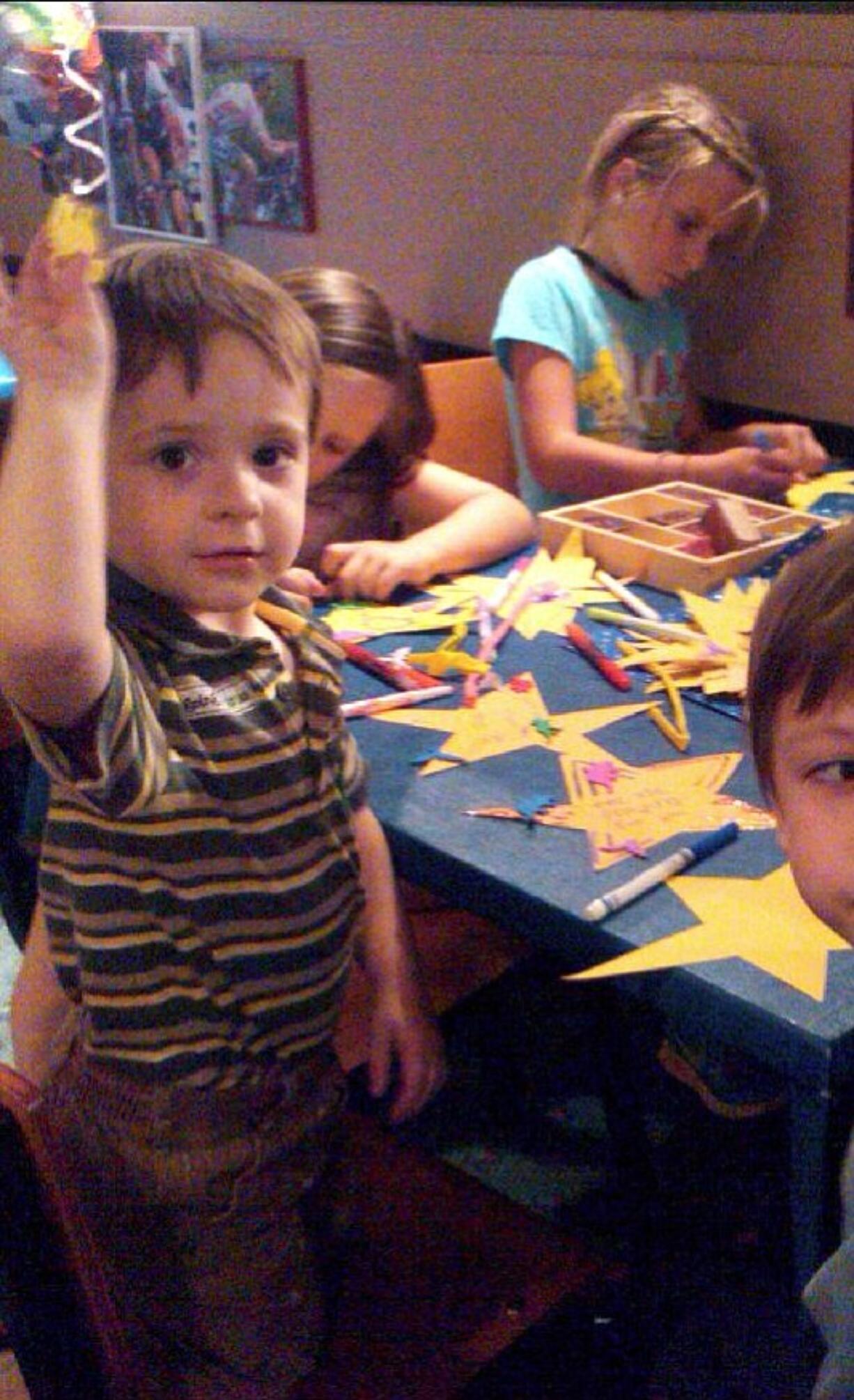 Northeast Hazel Dell: Alex Smith, left, and his brother Zack Smith make get well cards for children at Doernbecher Children's Hospital.