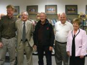 Former Maple Grove Primary principals and their last year at the school, from left, are Steve Lien, 2005; Tom Nadal, 1998; Chuck Anderson, 1986; and Duane Rose, 1983, with current principal Barbara Baird.