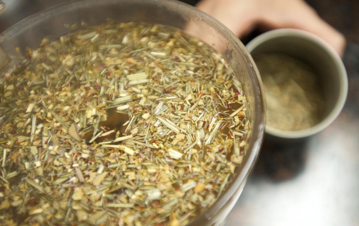 Ginger and Lime Green Rooibos tea steeps before being served at Gaia Java in Vancouver.