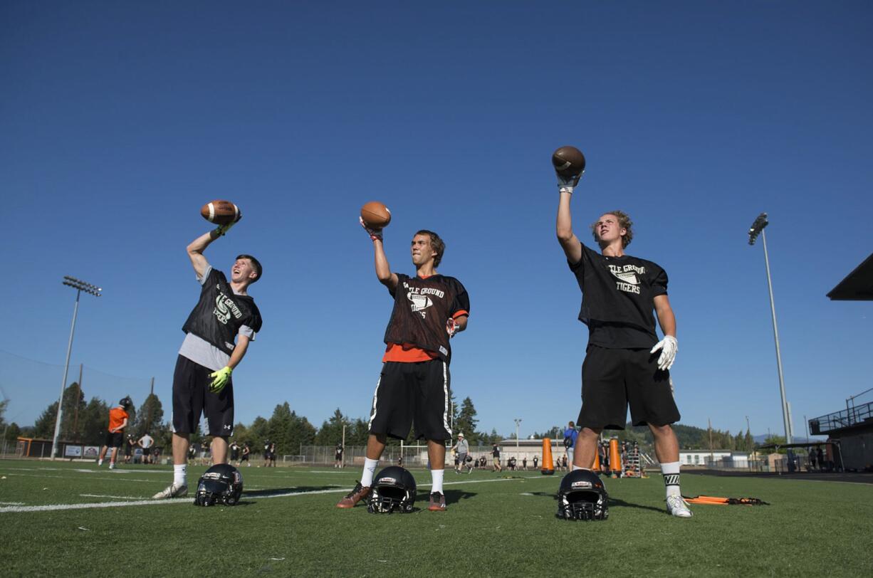 Battle Ground High School wide receivers Riley Betcher, from left, Chase Gunter and Max Randle are gearing up for the season.