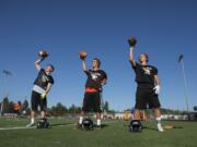 Battle Ground High School wide receivers Riley Betcher, from left, Chase Gunter and Max Randle are gearing up for the season.