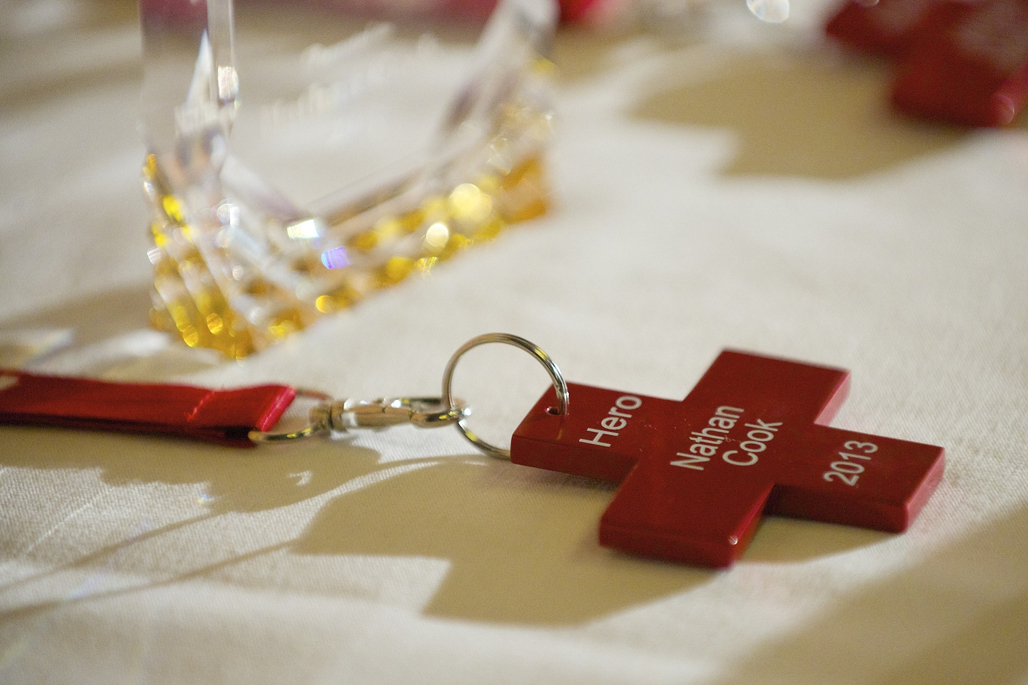 Nathan Cook's awards, as well as others, sit on a table at the annual Red Cross Real Heroes breakfast Friday March 8, 2013 in Vancouver, Washington. Cook received his award for an emergency response rescue.